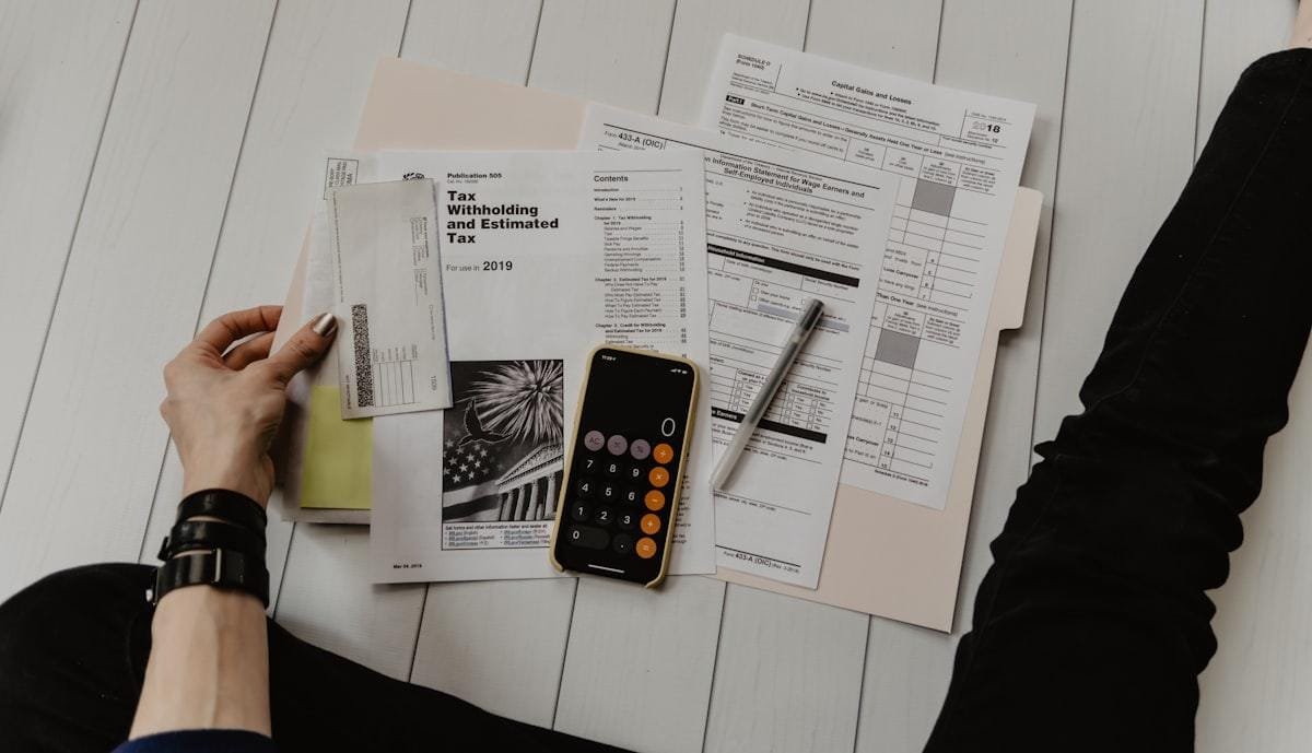 Accountant calculating bookkeeping costs for small business