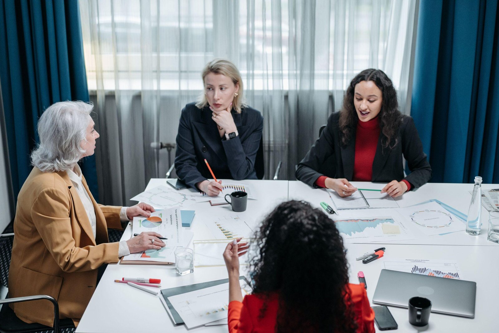 Business team meeting in an office — bookkeeping and payroll for professional firms